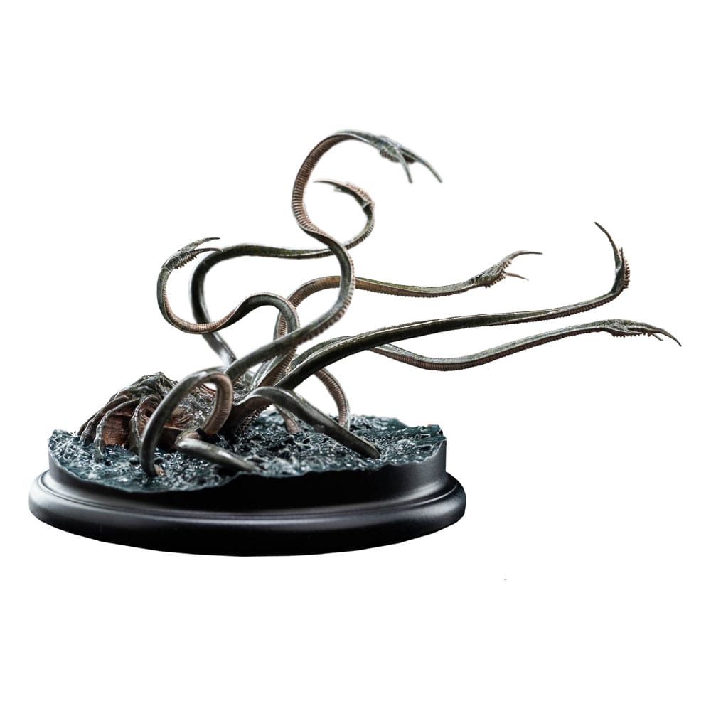Weta Workshop Watcher in the Water mini statue, low-profile side view on dark rocky base