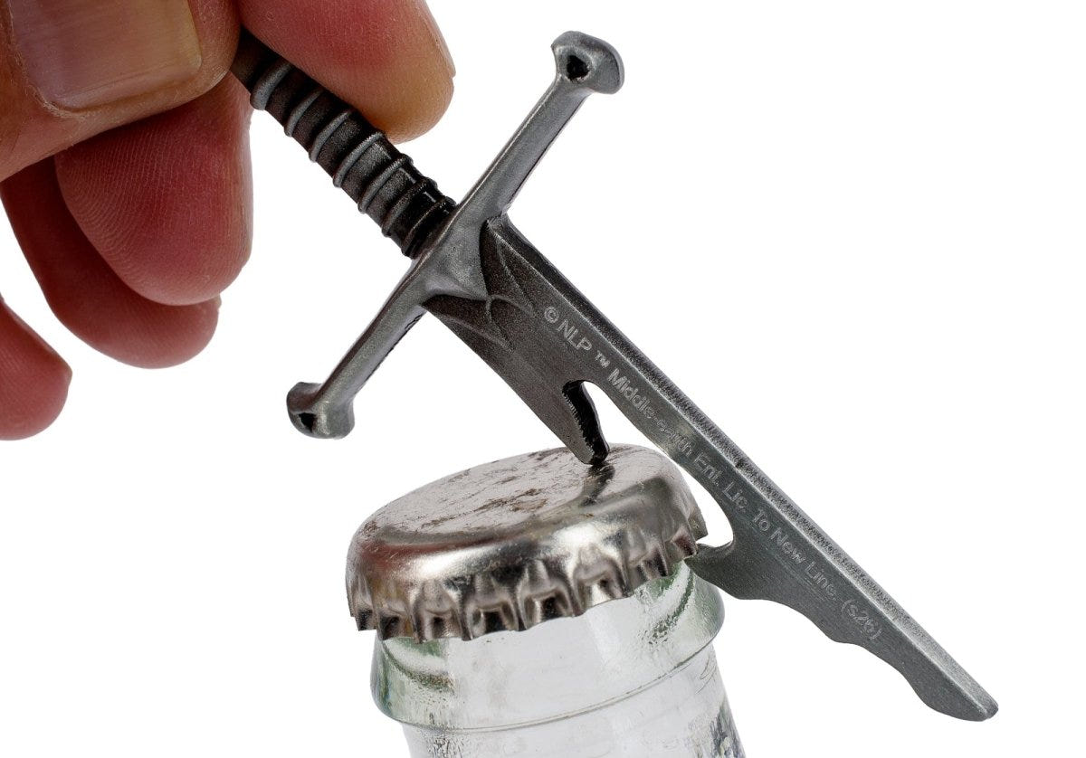 Narsil sword bottle opener levering the cap off a glass bottle