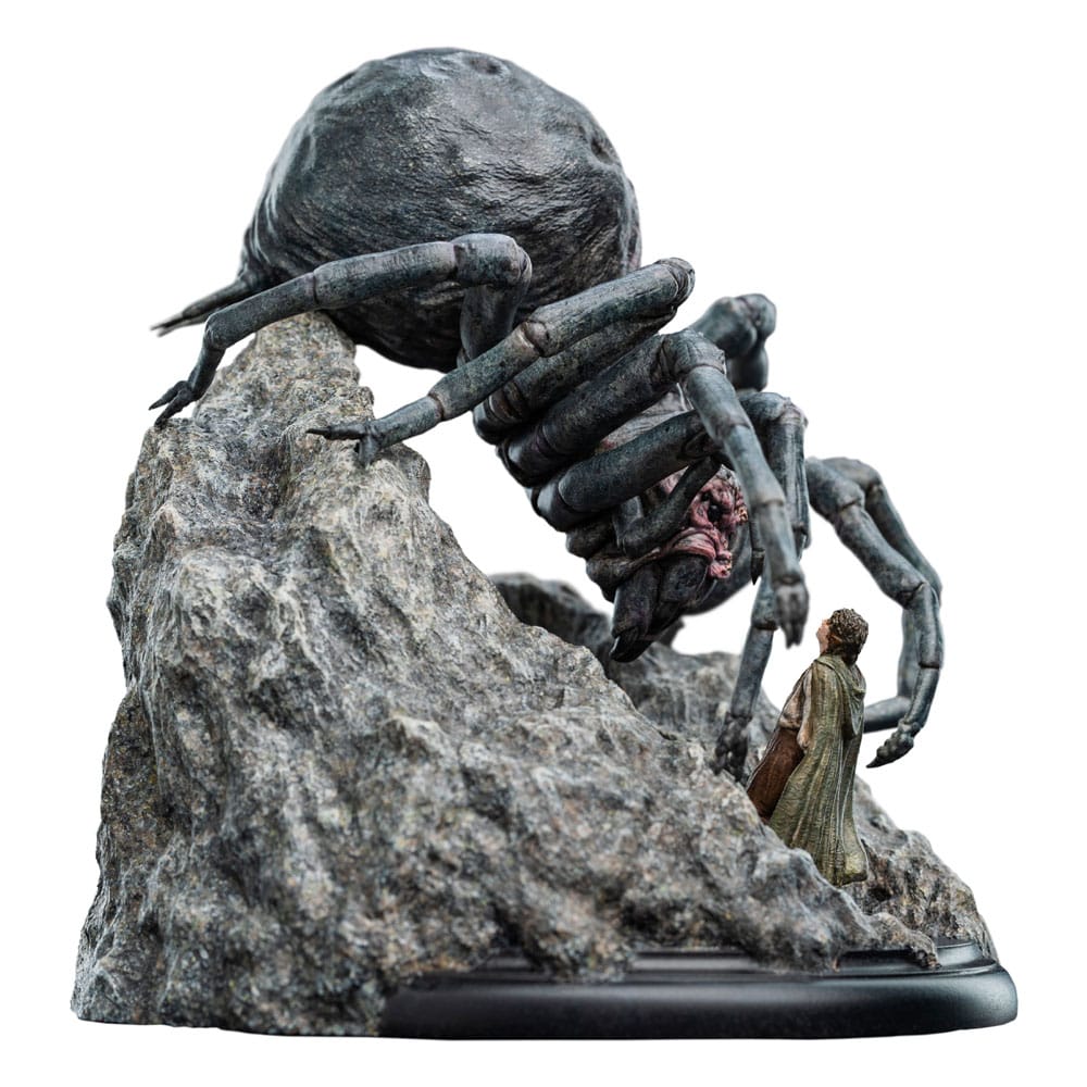 Shelob mini statue from the left side, crouched over the rocky tunnel base
