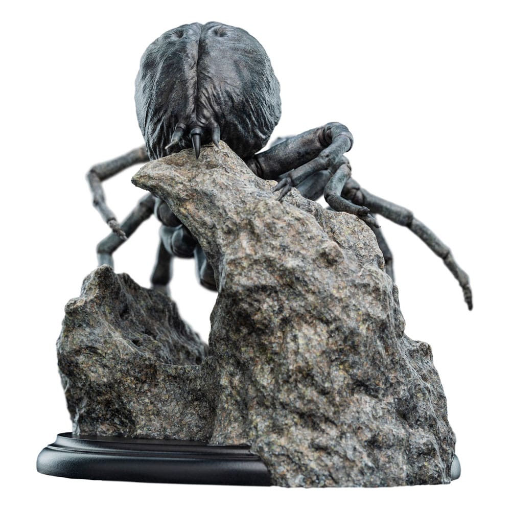 Rear view of the Weta Workshop Shelob statue showing her abdomen and rock base