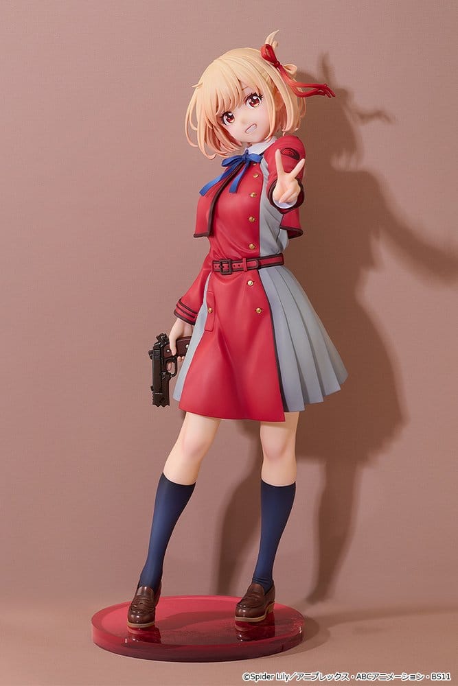 Front view of the Chisato Nishikigi 1/6 figure making a peace sign, on a red base