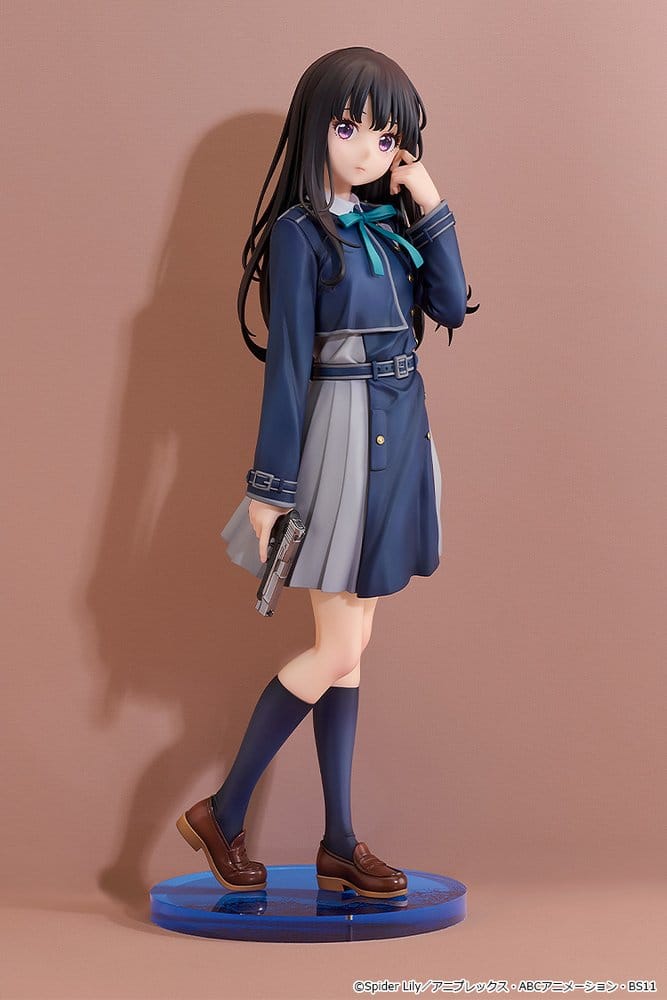 Front view of the Takina Inoue 1/6 scale figure on a blue base against a pink backdrop