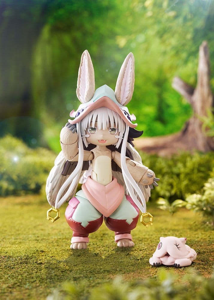 Nanachi figma standing on moss in a woodland diorama with Mitty resting nearby