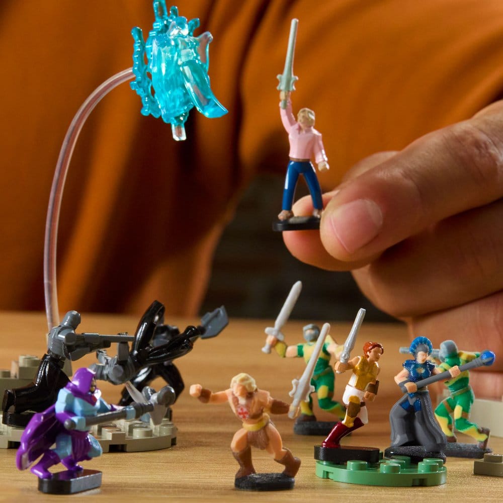 Hand posing NanoWorld figures from the Brick Shop Castle Grayskull set in a battle scene