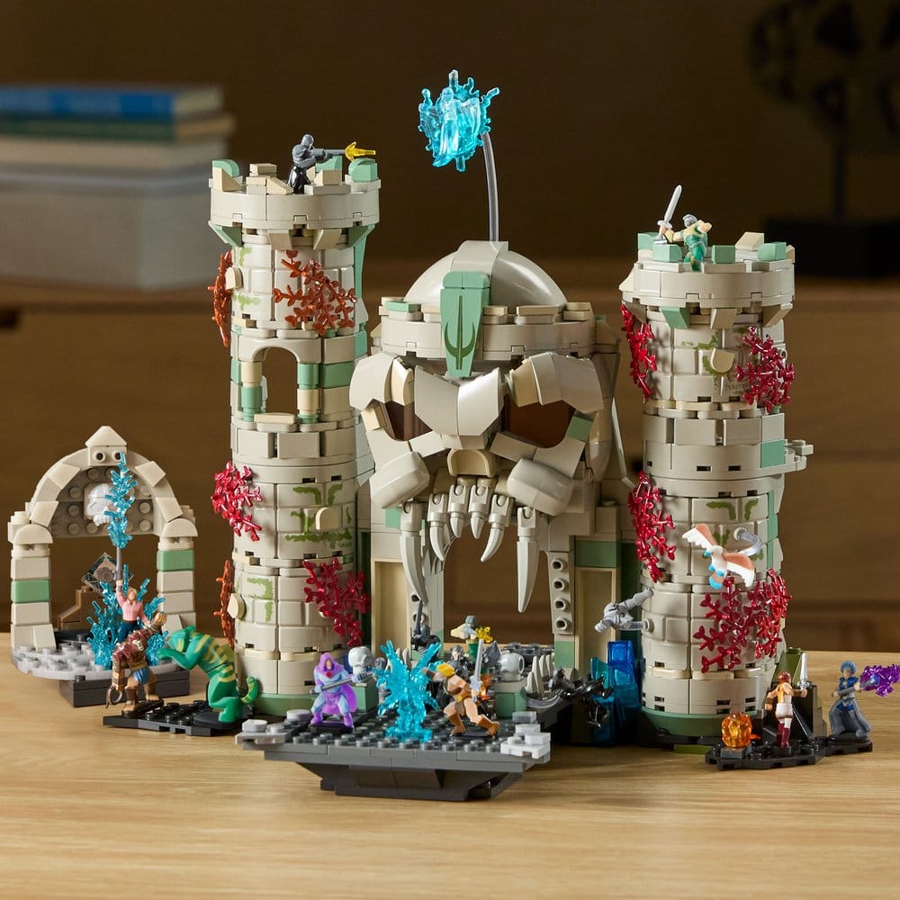 Brick Shop Castle Grayskull displayed on a wooden shelf with Masters of the Universe figures