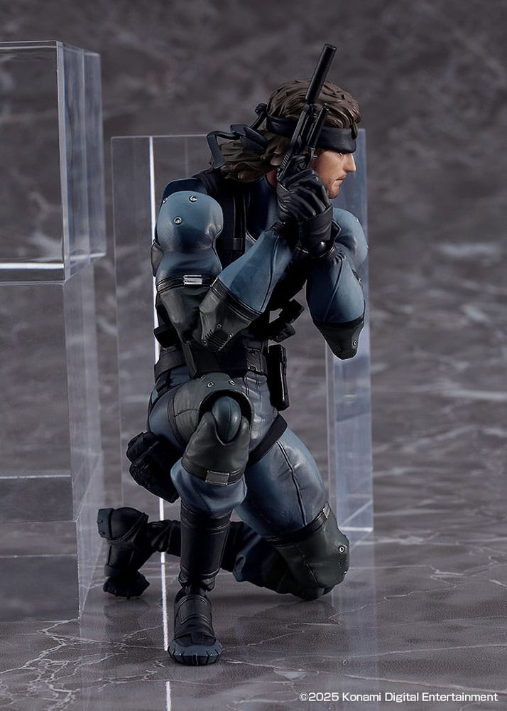 figma Solid Snake kneeling beside a clear panel, pointing a pistol upward
