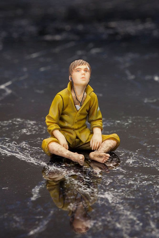 Metal Gear Solid V Ground Zero Set painted Chico figure sitting cross-legged in yellow