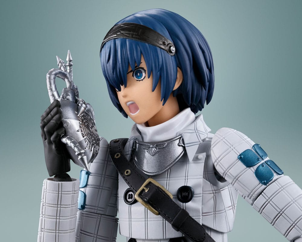 Close-up of the Metaphor: ReFantazio Protagonist figure holding a silver ornament