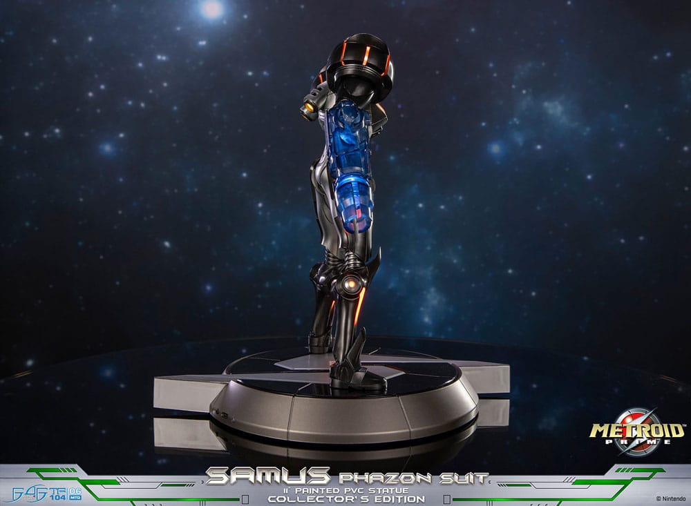 Side view of the lit Samus Phazon Suit statue against a starry space background