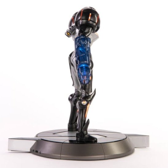 Right side profile of the Samus Phazon Suit statue with the blue Phazon Beam arm cannon