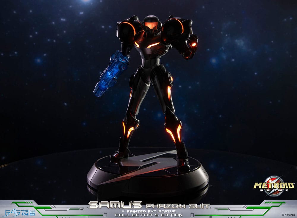Samus Phazon Suit statue lit in the dark showing the orange LED glow across the armour