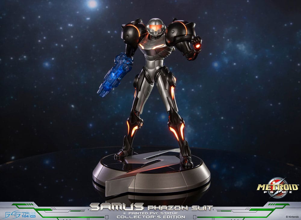 Front view of the Samus Phazon Suit statue with glowing visor and Phazon Beam, dark backdrop