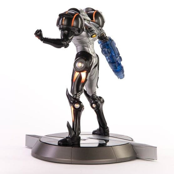 Rear three-quarter view of the Samus Phazon Suit statue on its Screw Attack emblem base
