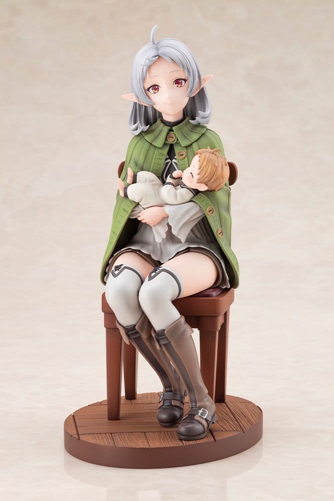 Sylphiette Greyrat holding sleeping baby Lucie on a chair, front view on beige backdrop