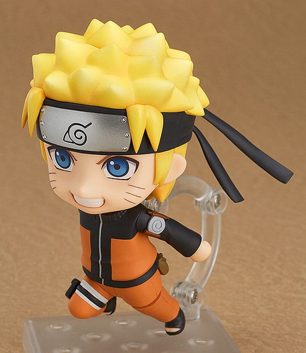 Naruto Uzumaki Nendoroid lunging forward in a running pose on a clear stand arm