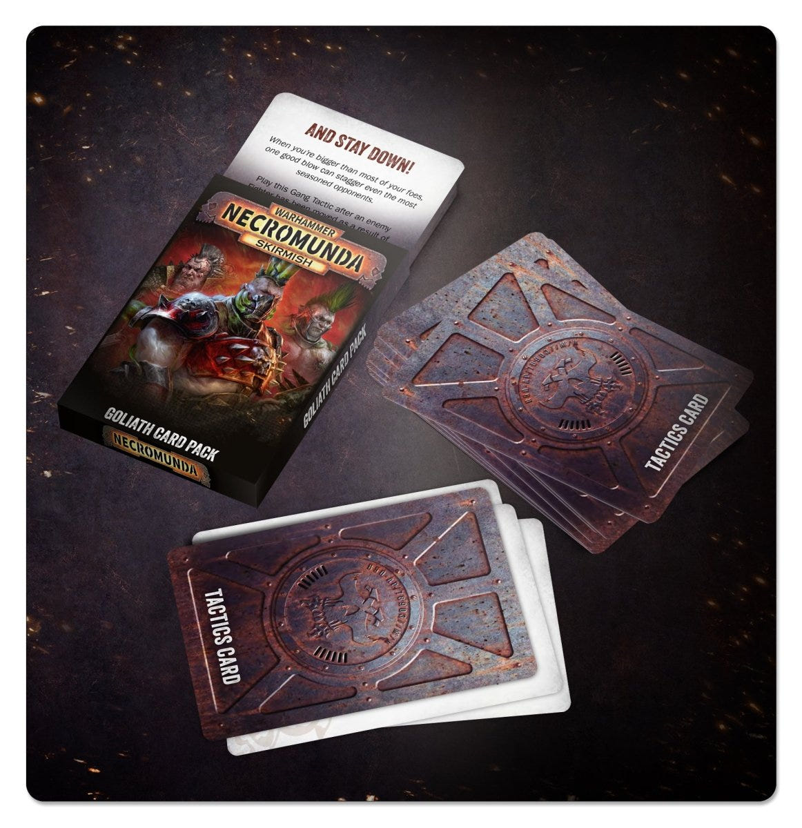 Necromunda Goliath Card Pack box with tactics cards fanned out on a dark surface