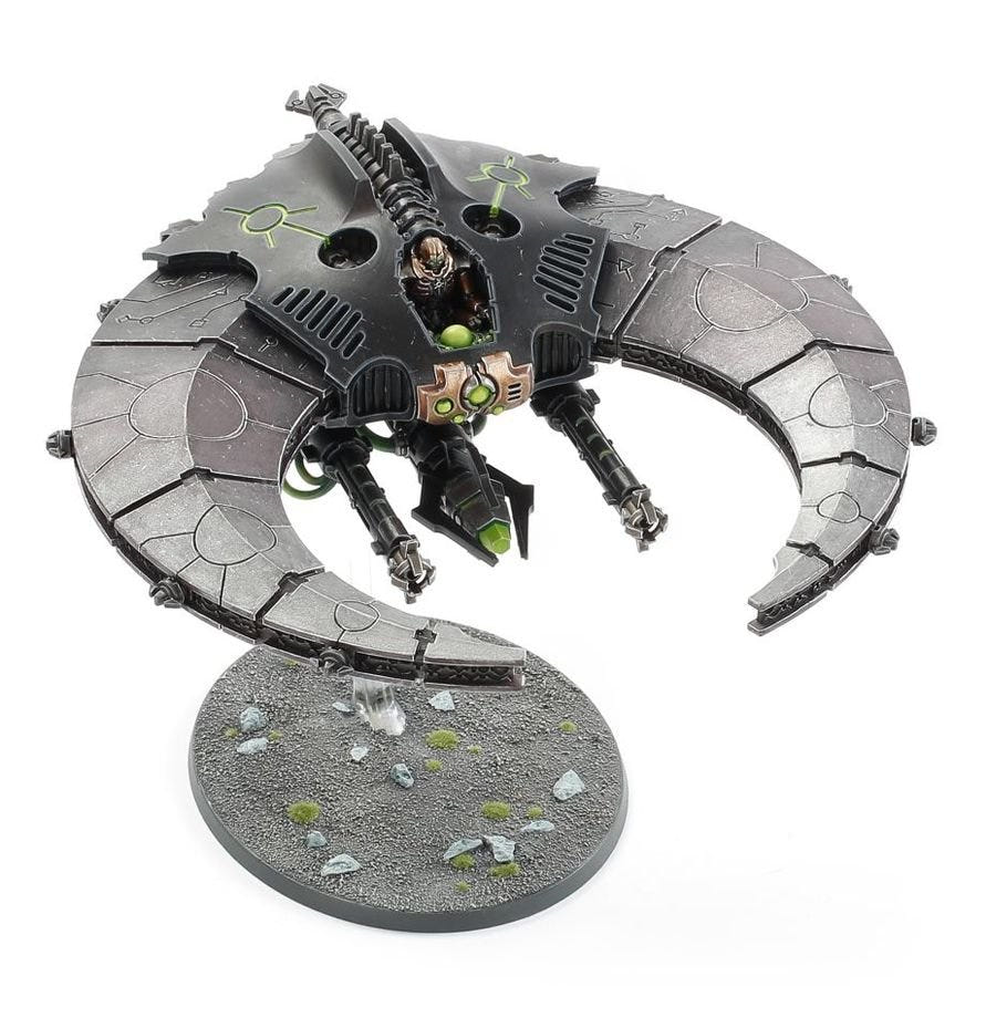 Painted Necrons Doom Scythe from a raised angle, showing the pilot and green-glowing canopy