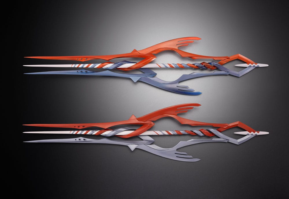 Two large red and silver forked spears from the Evangelion Metal Build 3 Spears Set, side by side