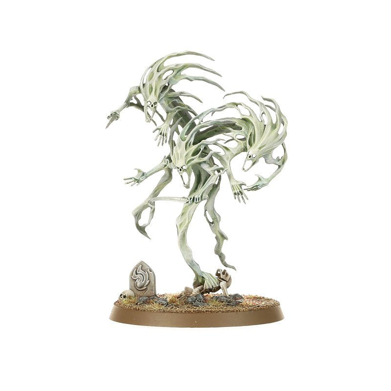 Painted Nighthaunt Spirit Host ghostly cluster, side view beside a tombstone