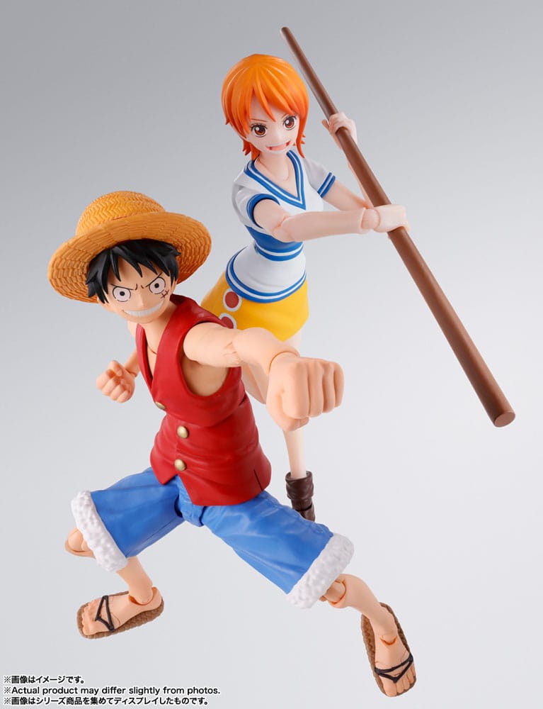 One Piece S.H.Figuarts Nami Romance Dawn figure, posed with a Luffy figure