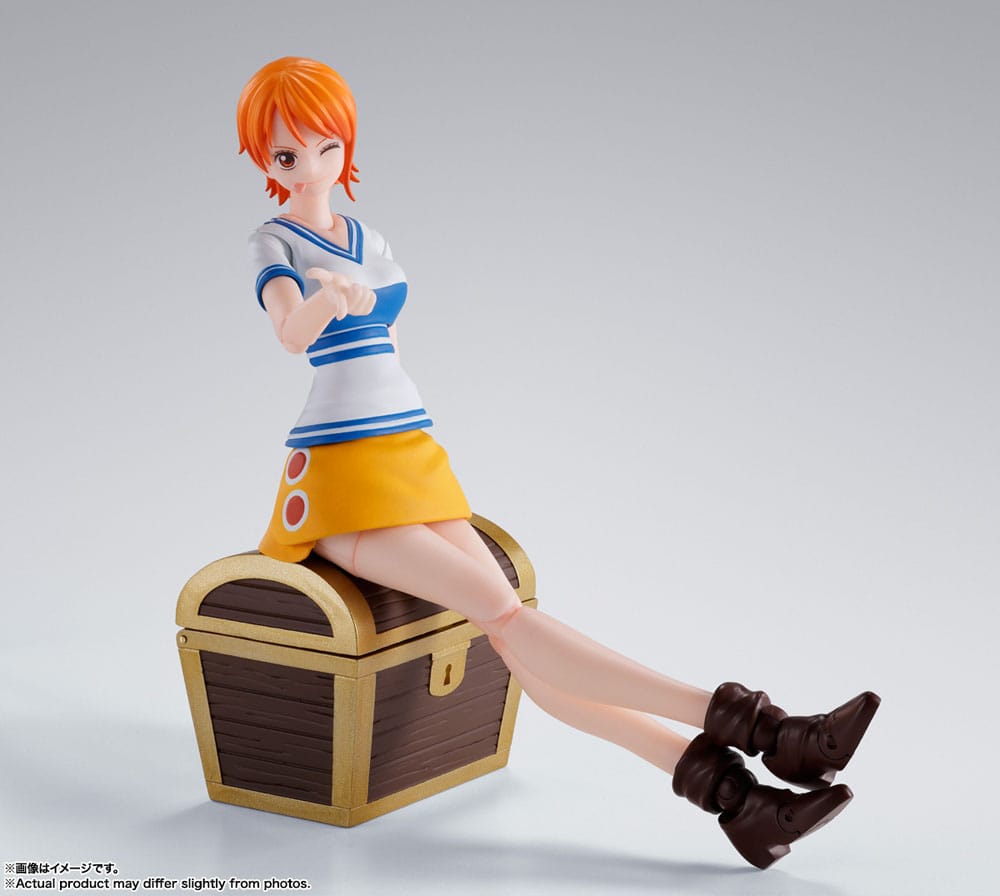 One Piece S.H.Figuarts Nami Romance Dawn figure, seated on a treasure chest