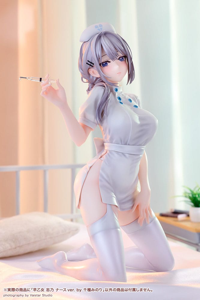 Saotome Shino Nurse Ver. figure kneeling on a bed in a softly lit hospital room scene