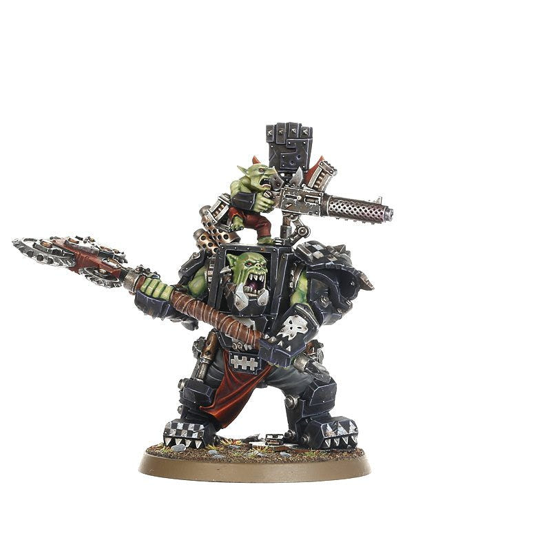 Ork Warboss in Mega Armour on its base, wider front view with choppa raised