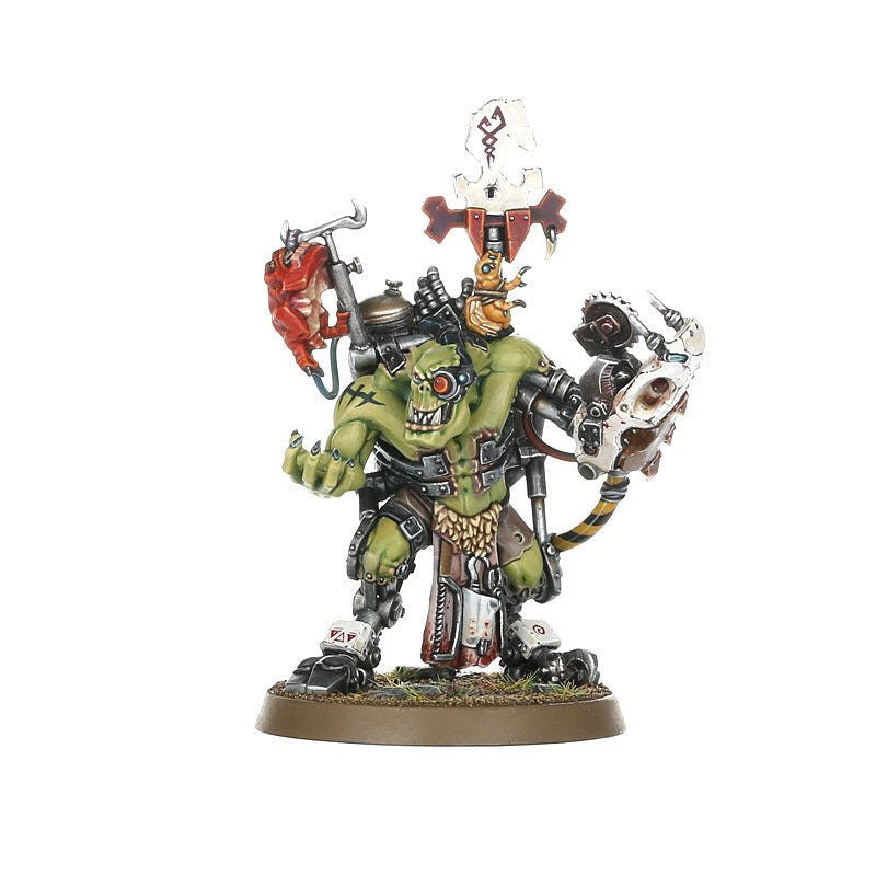 Painted Ork Painboss front view with claw arm, saw and trophy banner on a 40mm base