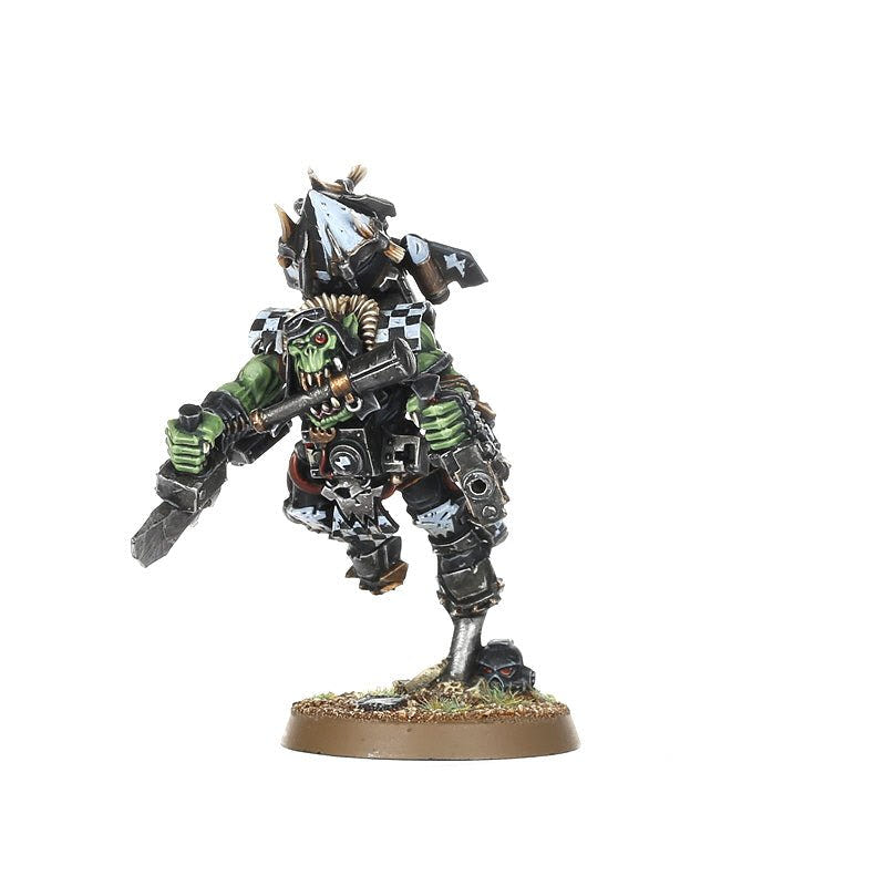 Painted Ork Stormboy with spiked helmet and choppa flying forward on rokkit pack
