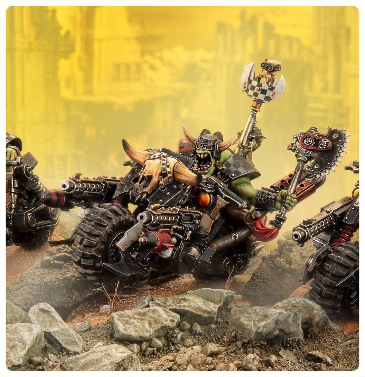 Ork Warbikers racing across a desert battlefield