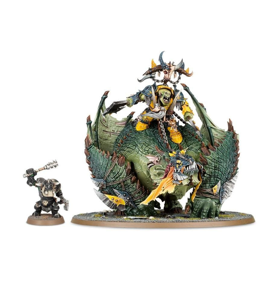 Painted Gordrakk on Maw-krusha beside an Orruk Ardboy miniature for scale