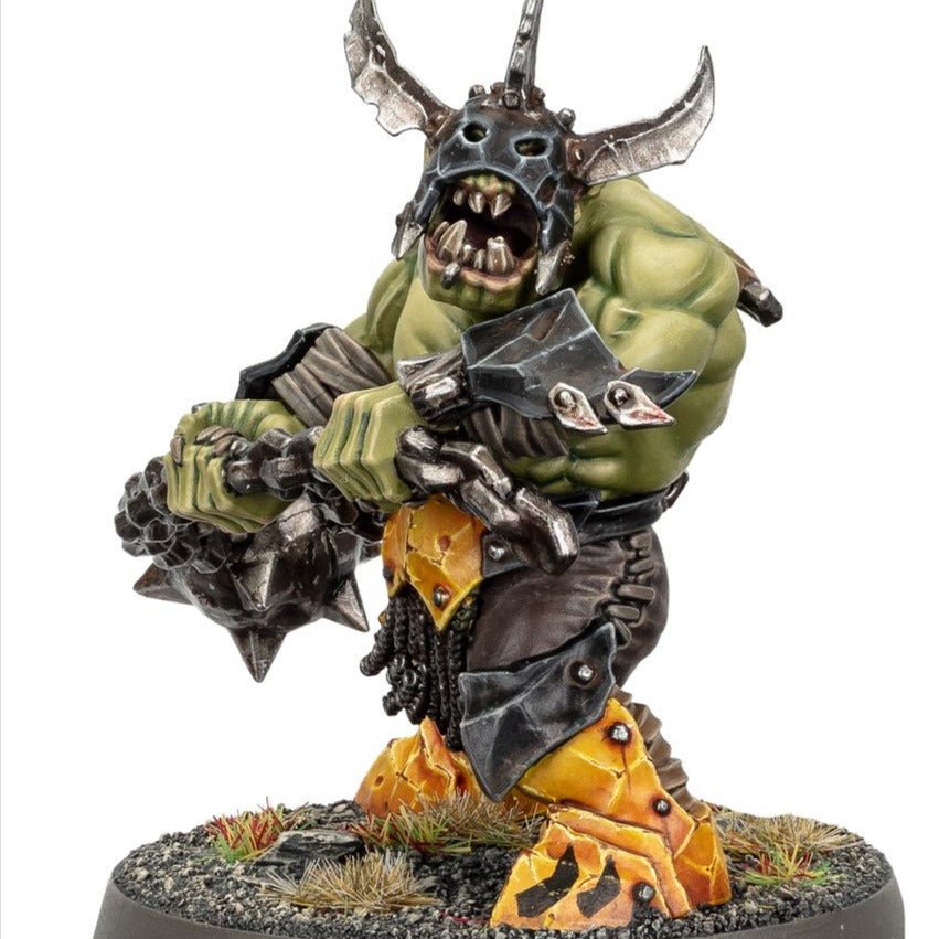 Close-up of a painted Weirdbrute Wrekka in a horned iron mask gripping a spiked chain-smasha flail