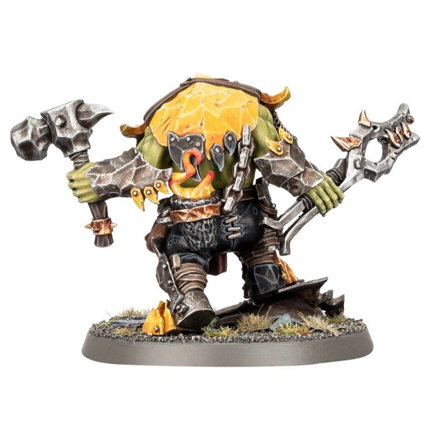 Painted Zoggrok Anvilsmasha miniature, rear view showing tools and yellow back plate