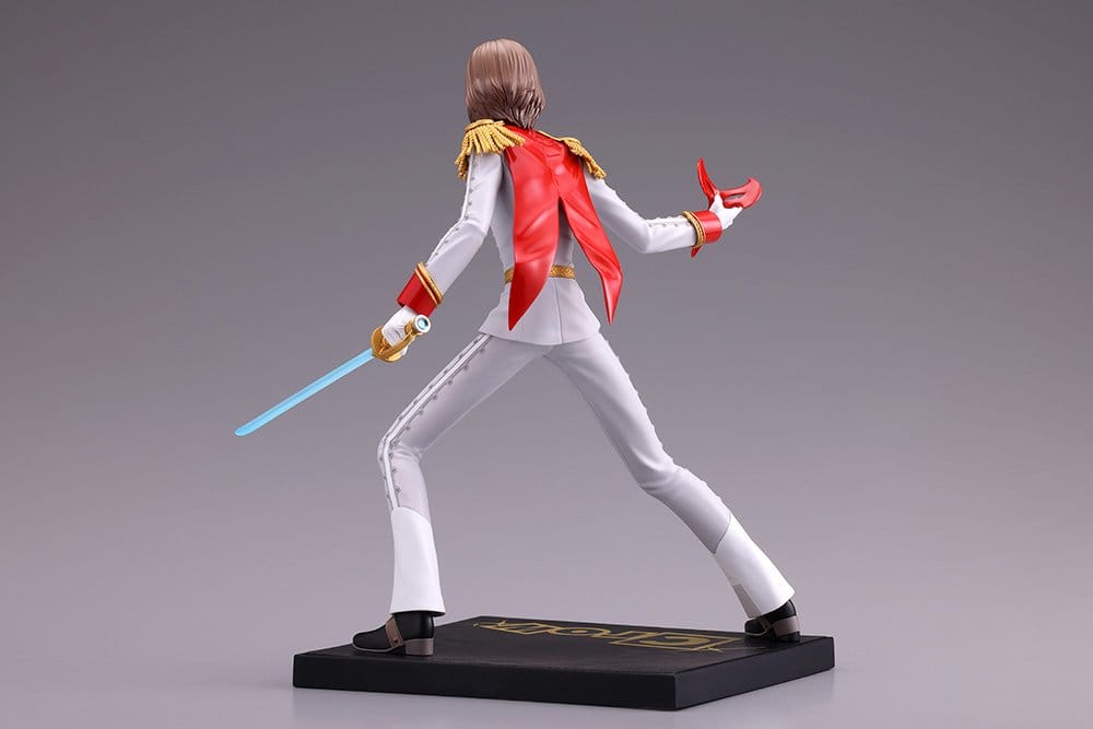 Rear three-quarter view of the Persona 5 Royal Crow figure with red cape on gold-logo base
