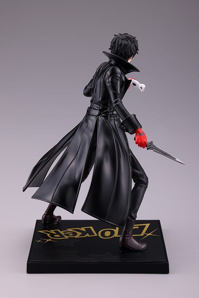 Rear three-quarter view of the Persona 5 Royal Joker figure showing his long black coat