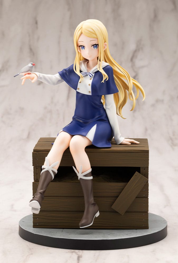Front view of the Sasaki and Peeps Elsa statue in blue dress on a round grey base
