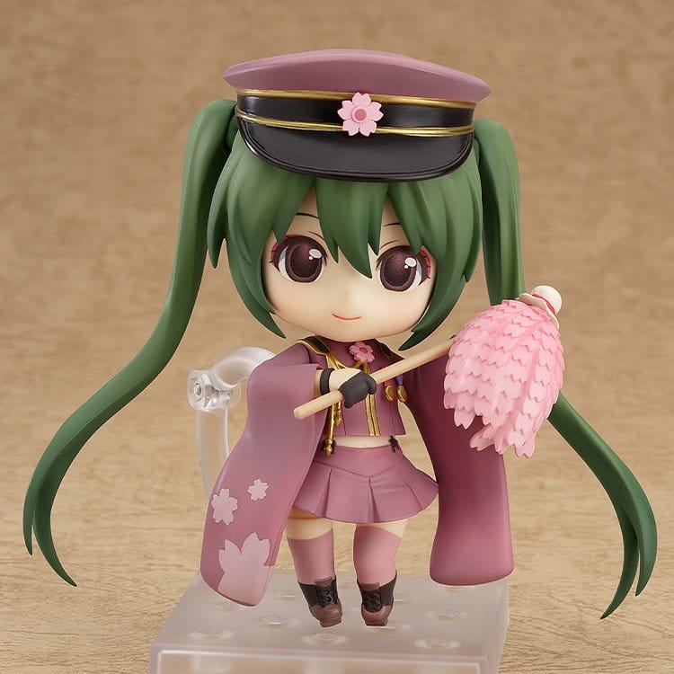 Nendoroid Miku Senbonzakura Ver. on clear stand with feather duster, front view