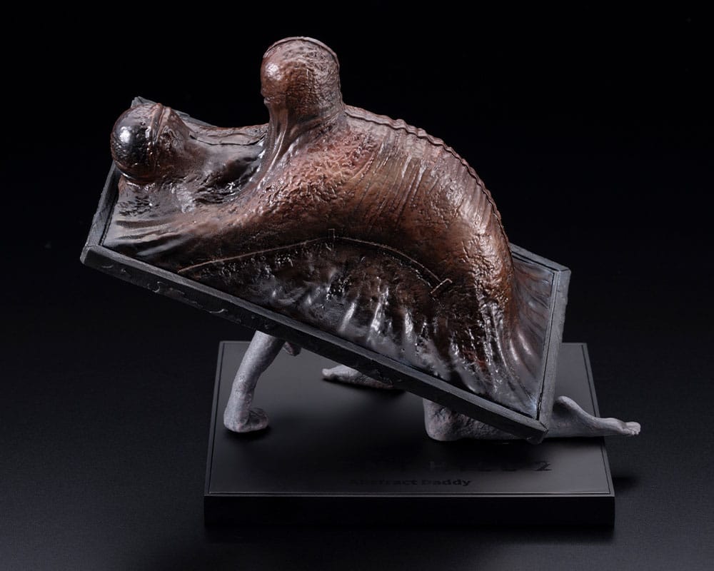 Abstract Daddy Oshi Works statue by Kotobukiya, side view of the creature and bed frame