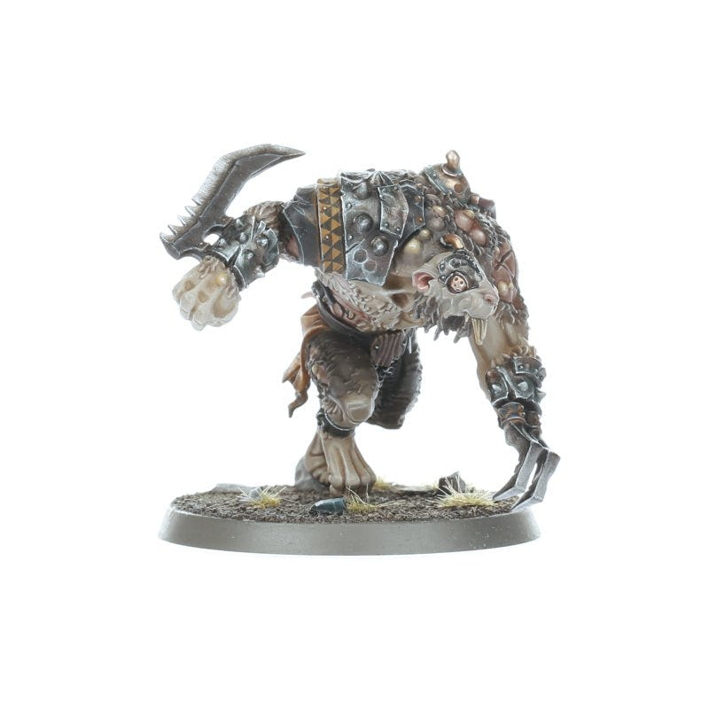 Painted Rat Ogor lunging with a jagged blade arm and armoured shoulder