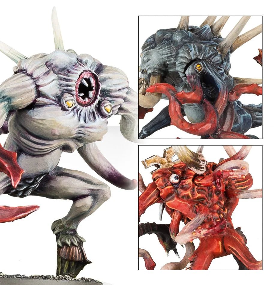 Close-ups of painted Chaos Spawn heads: a single giant eye, horned grey maw and red fanged face
