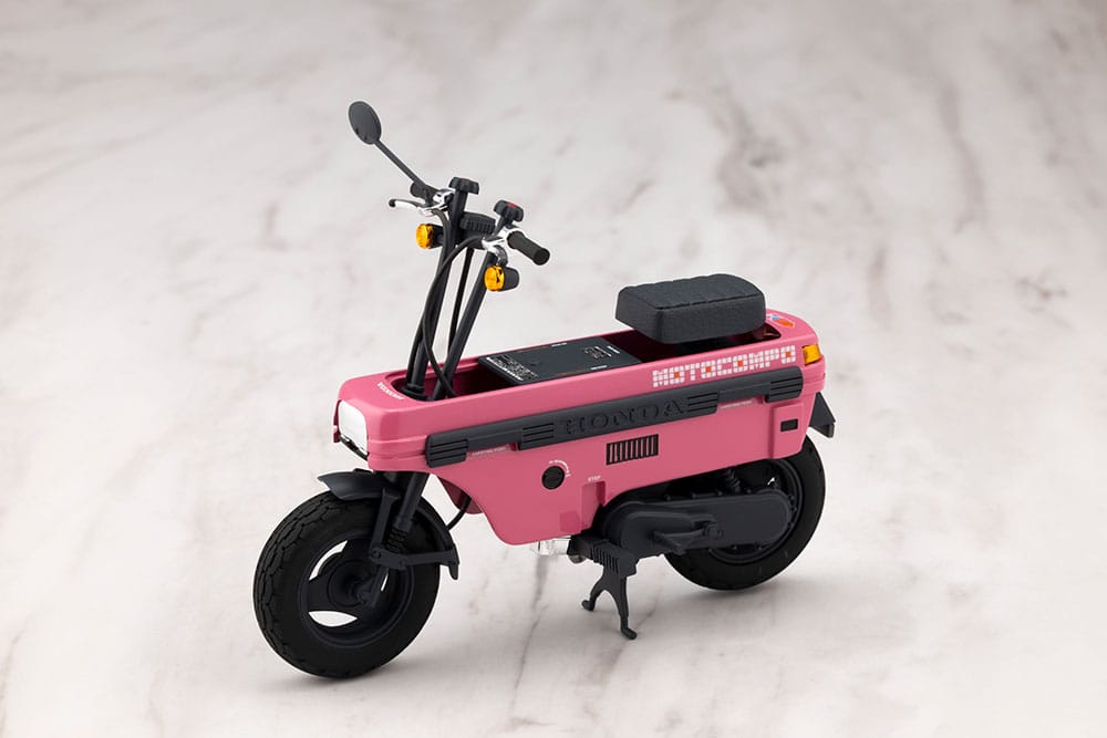 Aoshima 1/12 Honda AB12 Motocompo in pink, three-quarter front view