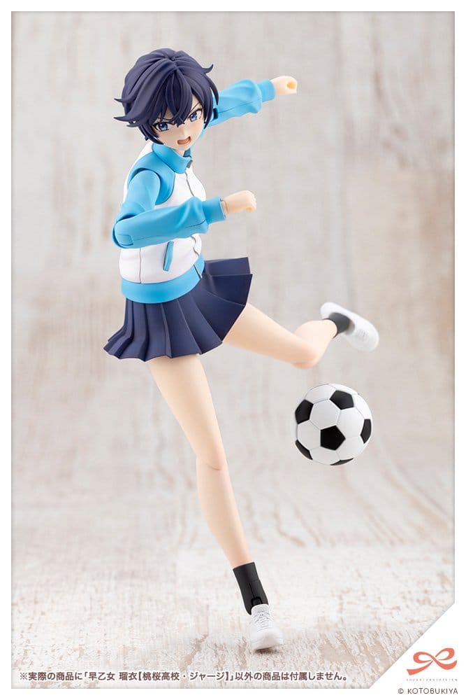 Rui Saotome Tracksuit kit kicking a football mid-stride