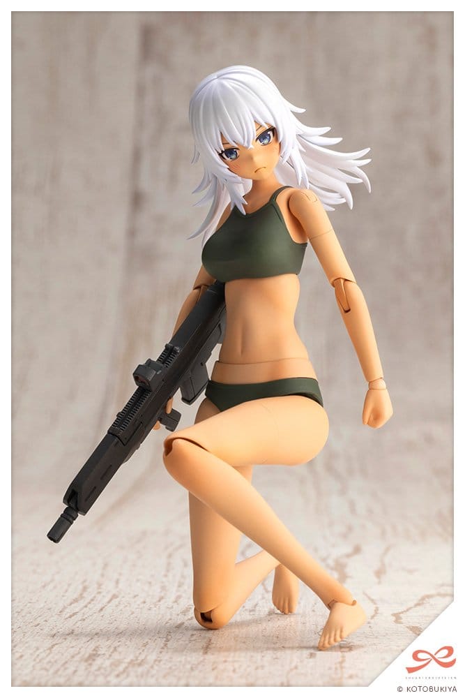 Training Wolf model kit kneeling with rifle in green top and shorts