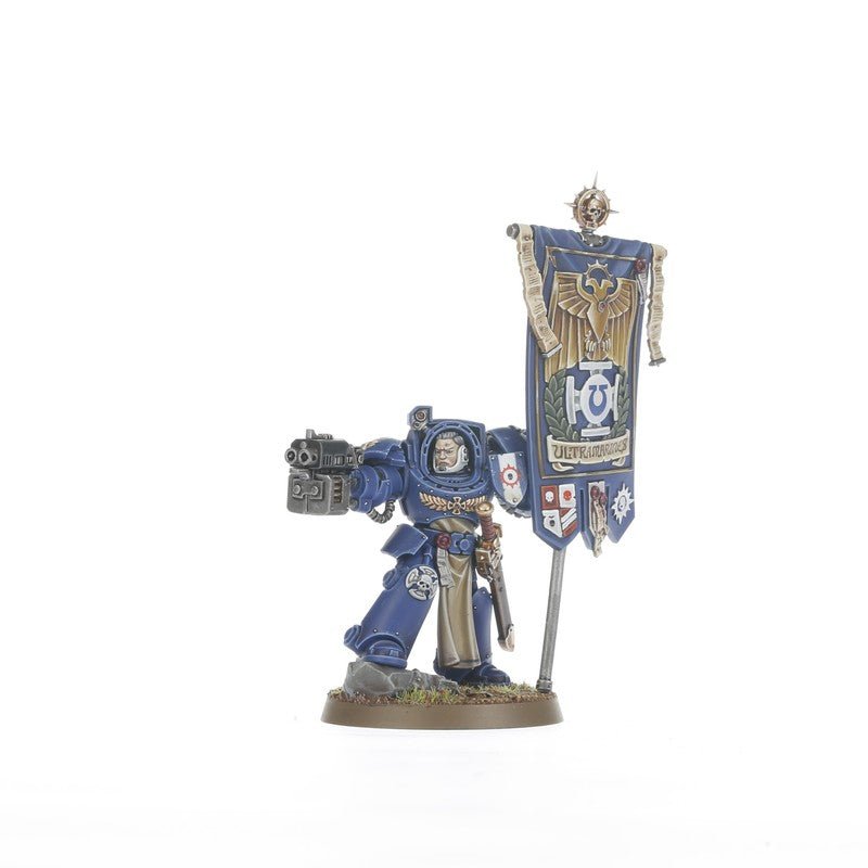 Smaller full view of the Space Marines Ancient in Terminator Armour with banner on a round base