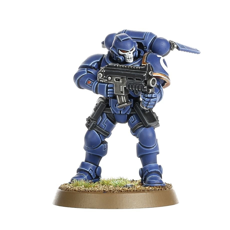 Painted Primaris Reiver in blue Mk X armour with skull-faced helmet and bolt carbine, front view