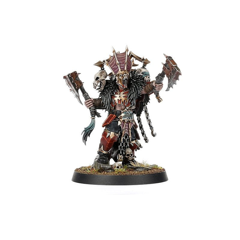 Painted Blades of Khorne champion in fur cloak with twin axes and skull trophies