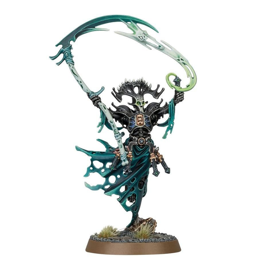 Painted Ossiarch Bonereapers hero in green robes wielding a sweeping scythe