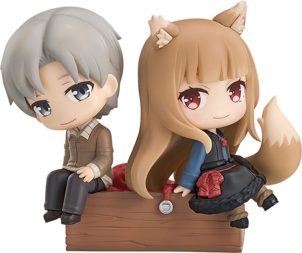 Good Smile Mini Memory Spice and Wolf Lawrence and Holo sitting on a crate, white background