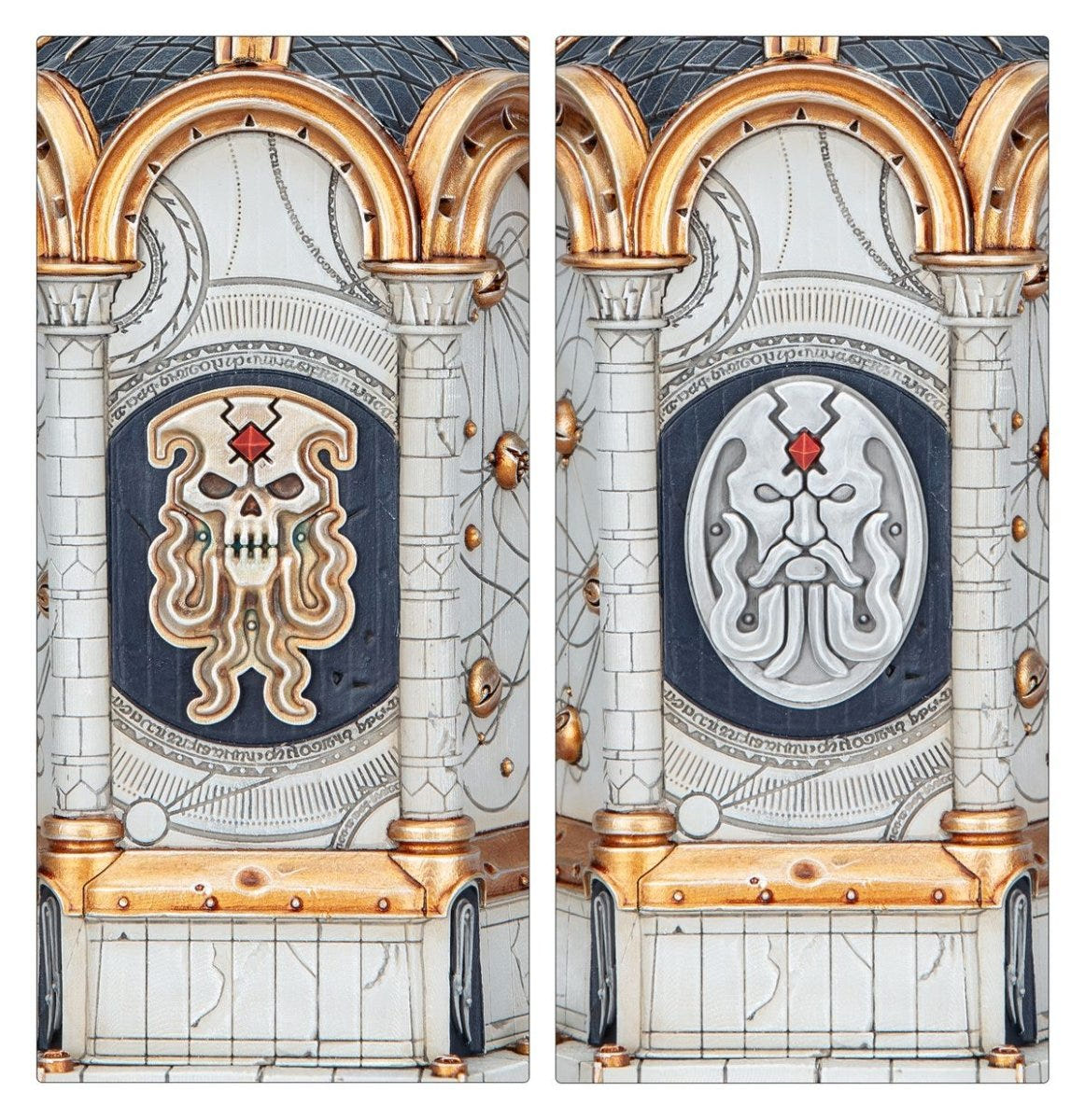 Close-up of the painted Stormreach Portal side panels with sculpted skull and face emblems