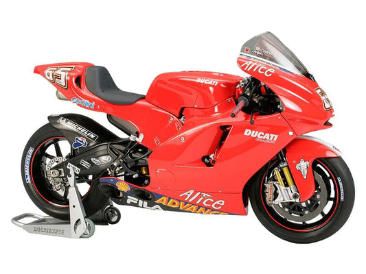 Tamiya 1/12 Ducati Desmosedici kit, built model in red race livery on paddock stand, side view